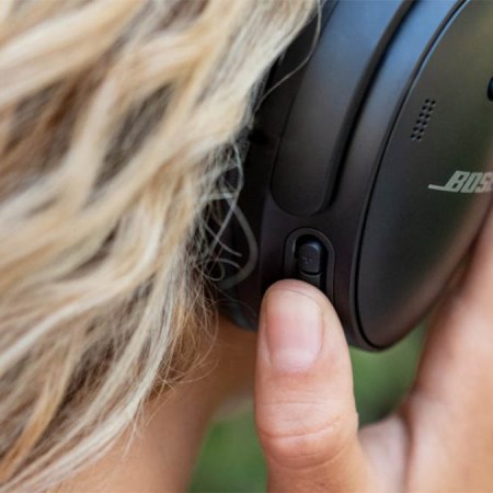 A person wearing Bose headphones, close-up. Bose's Black Friday sale has started early