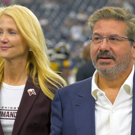 Washington owners Tanya Snyder and Dan Snyder on the field.