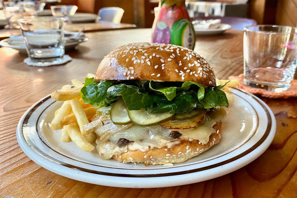 The Exchange’s White Cheddar Cheeseburger With Griddled Onions And Confit Tomato Aioli