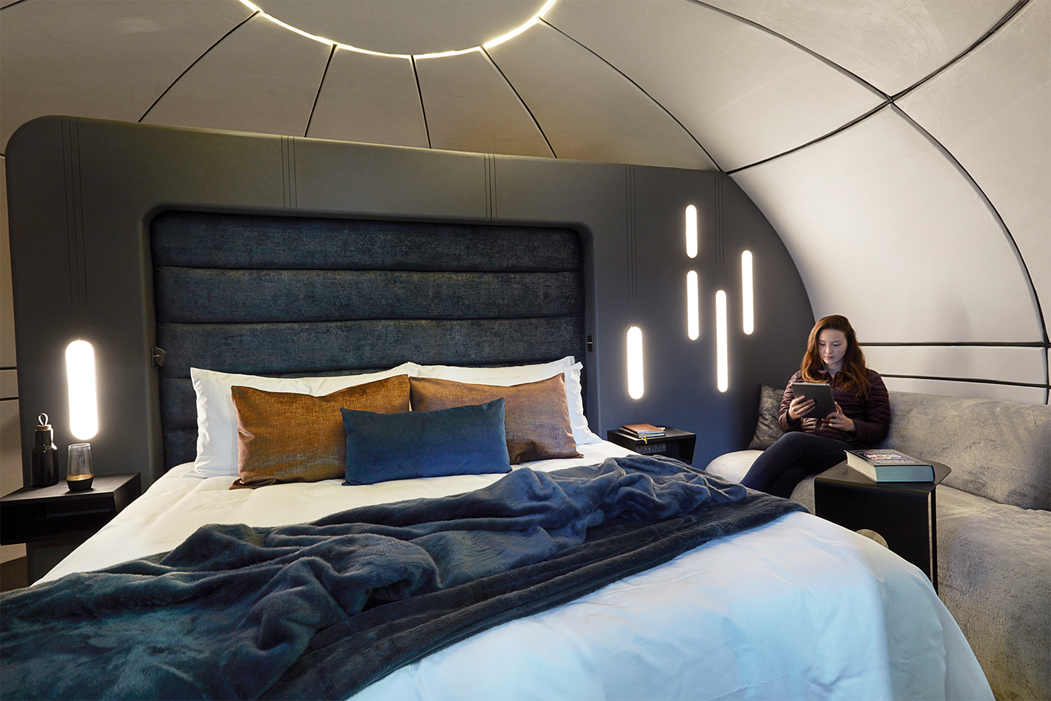 A woman sitting inside a Sky Pod at White Desert's Echo camp in Antarctica