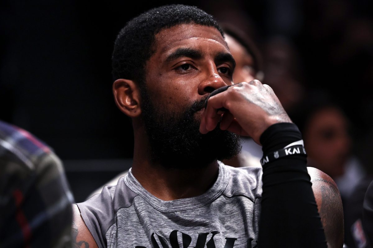 Kyrie Irving of the Brooklyn Nets looks on from the bench at Barclays Center.