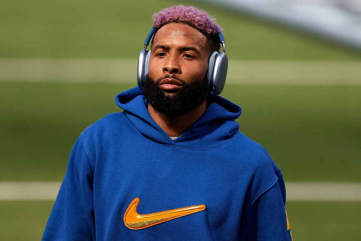Odell Beckham Jr. warms up before Super Bowl LVI at SoFi Stadium in a Nike hoodie. He recently sued the company for more than $20 million for breach of contract.