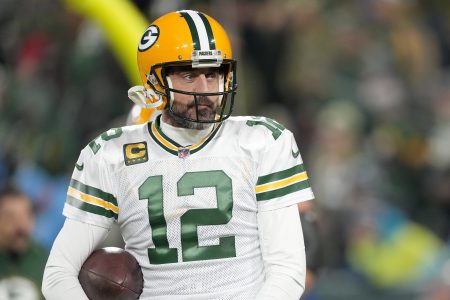 Aaron Rodgers warms up prior to the game against the Tennessee Titans. The Packers blew their chance Thursday night at becoming the NFL's winningest team in history.