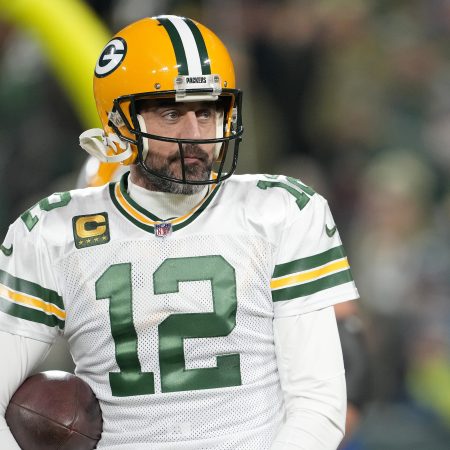 Aaron Rodgers warms up prior to the game against the Tennessee Titans. The Packers blew their chance Thursday night at becoming the NFL's winningest team in history.