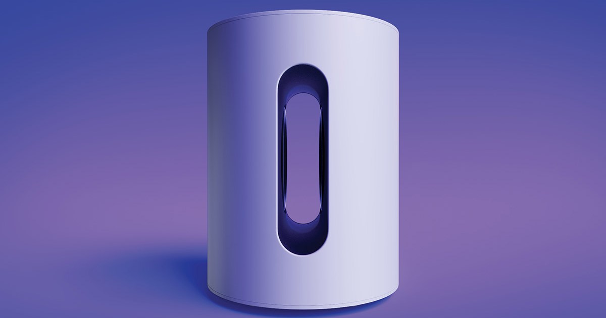 A white Sonos Sub Mini on a purple background. The mini is a new compact subwoofer.