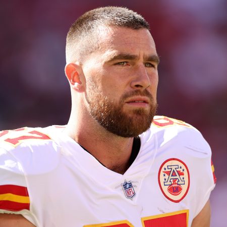 Travis Kelce of the Chiefs warms up during a game before the 49ers.
