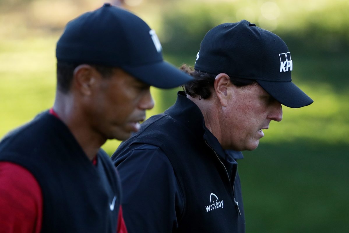Tiger Woods and Phil Mickelson walk during The Match in 2018 in Las Vegas.