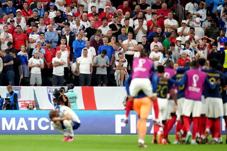 England supporters look on in despair after Harry Kane's penalty attempt sailed over the goalpoast.