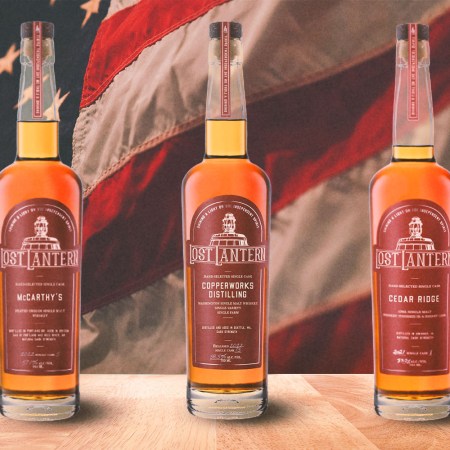 Three American Single Malts from Lost Lantern in front of an American flag