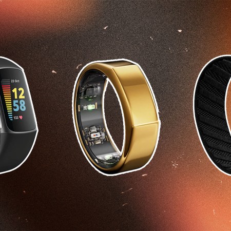 Fitness wearables on a pink, pruple and orange textured background