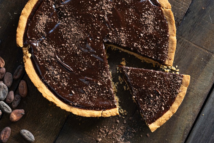boozy desserts chocolate whiskey pie on a wooden table