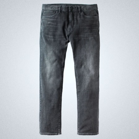 a pair of grey-black Outerknown jeans on a grey background
