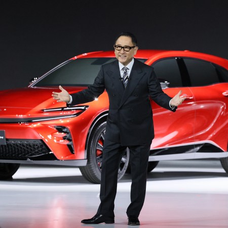 Akio Toyoda, president of Toyota, reveals the Crown lineup in July. None of them are currently all-electric.
