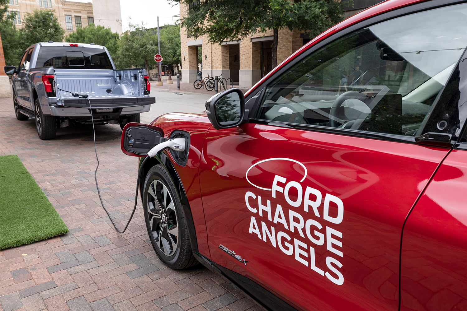 The Ford F-150 Lightning charging a Mustang Mach-E from its own battery pack