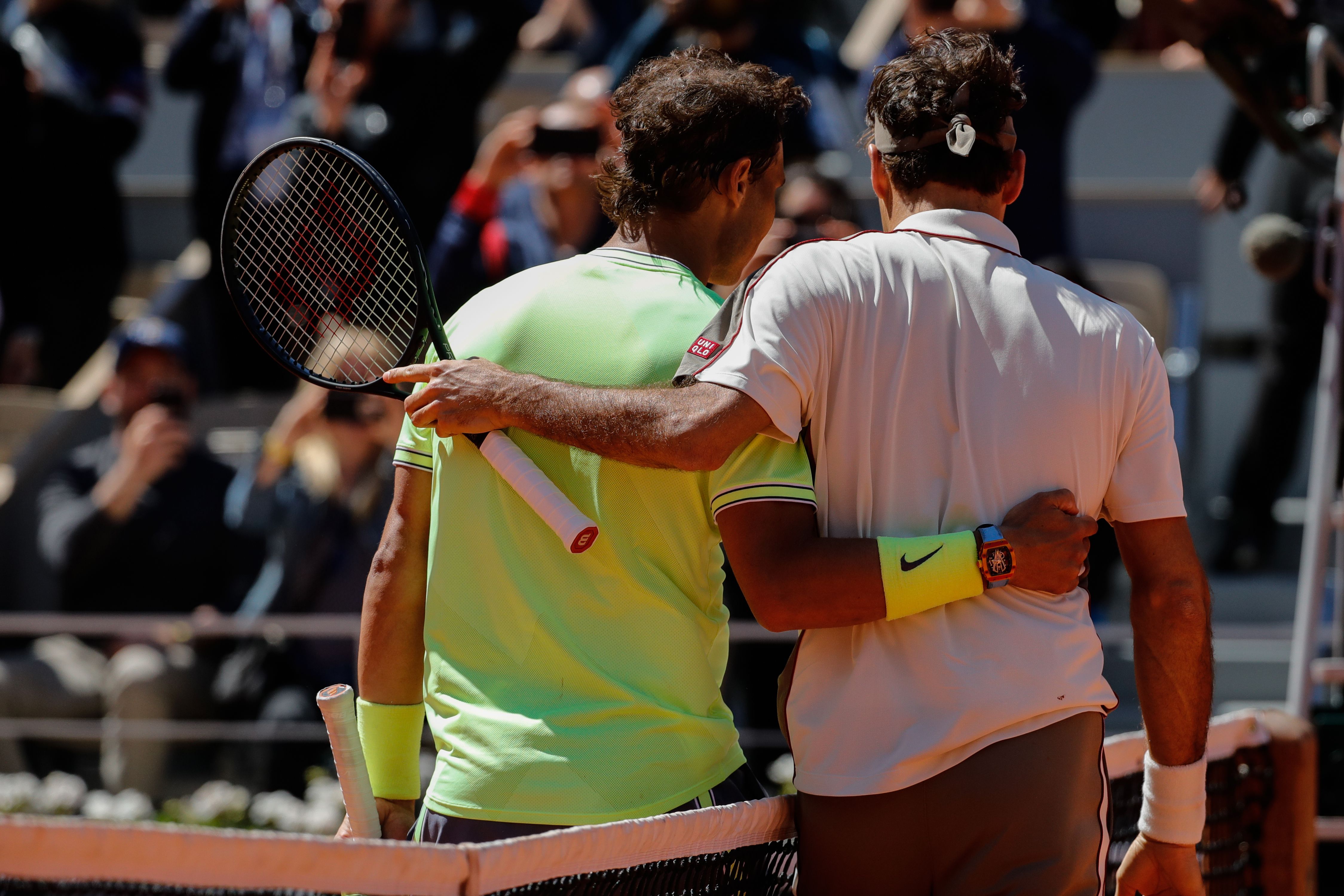 Rafael Nadal and Roger Federer, seen here embracing, have known each other for two decades