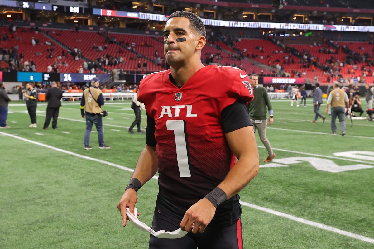 Marcus Mariota jogs off the field after Atlanta's win over the Bears.
