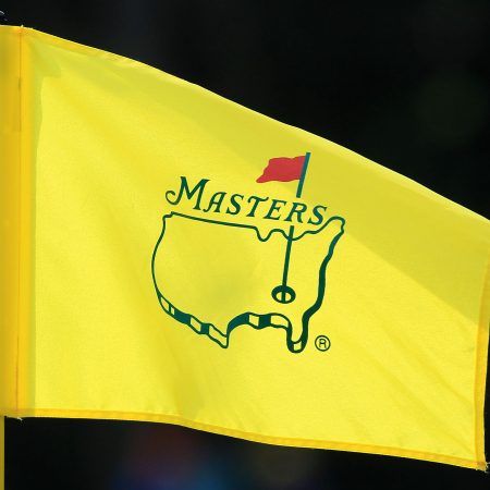 The Masters logo on a yellow flag. August National Golf Club is receiving blowback from 9/11 families after allowing LIV Golf players to compete.