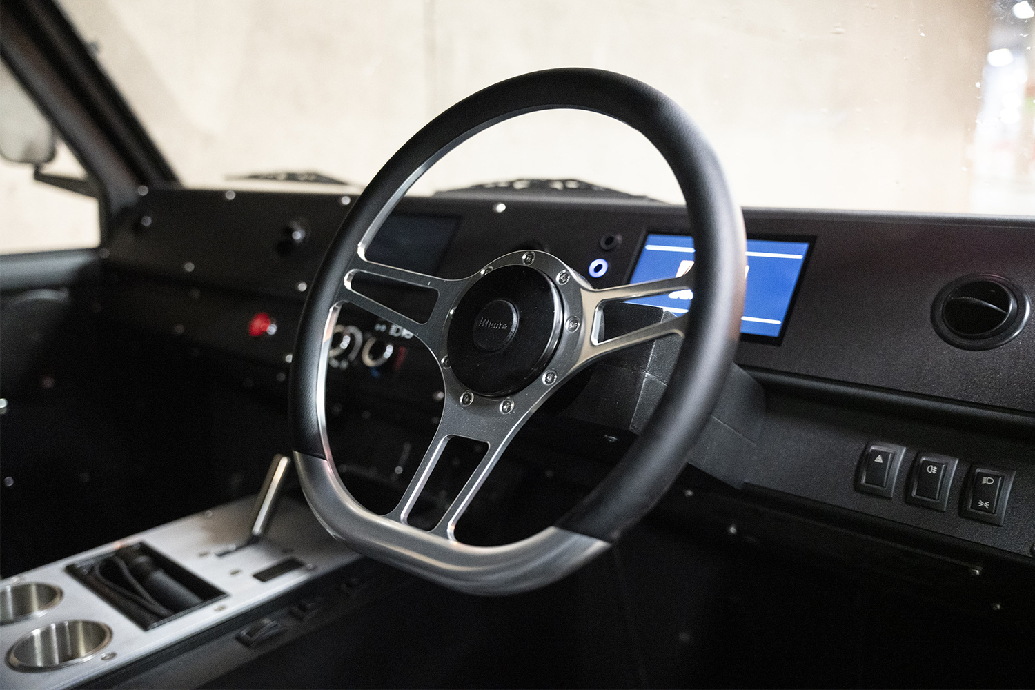 The interior and dashboard of the Munro MK_1, a new electric 4x4 that will be built in Scotland