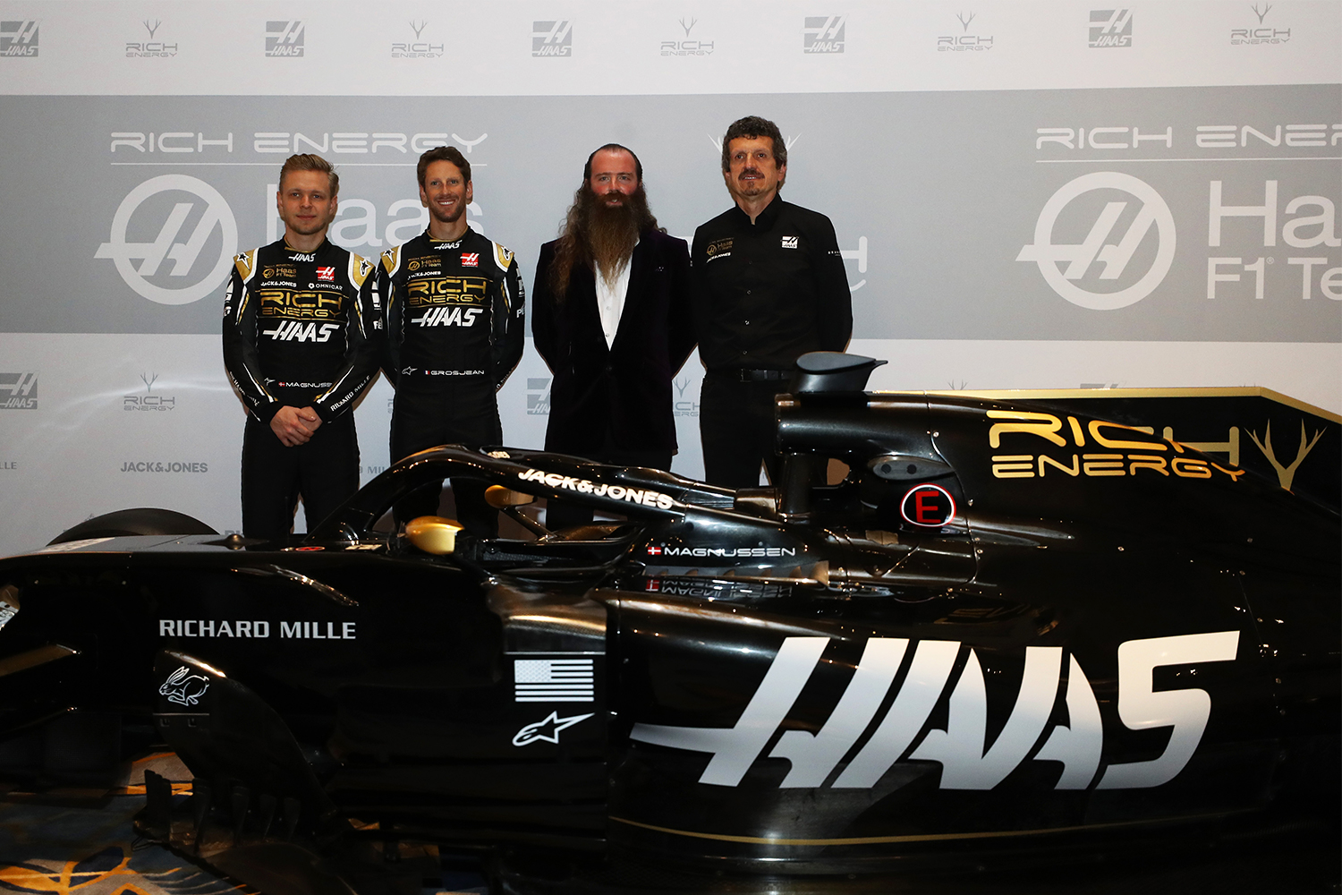 (L-R) Haas drivers Kevin Magnussen and Romain Grosjean, Rich Energy CEO William Storey and Haas Team Principal Guenther Steiner in February 2019.