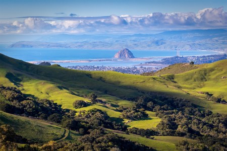 A photo taken in the hills outside of San Luis Obispo, California. The town of Morro Bay and the Pacific Ocean can be seen in the distance.