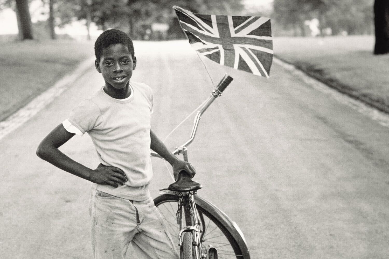 Boy with Flag, Winford in Handsworth Park , 1970, printed 2022 gelatin silver print National Gallery of Art, Washington, Alfred H. Moses and Fern M. Schad Fund