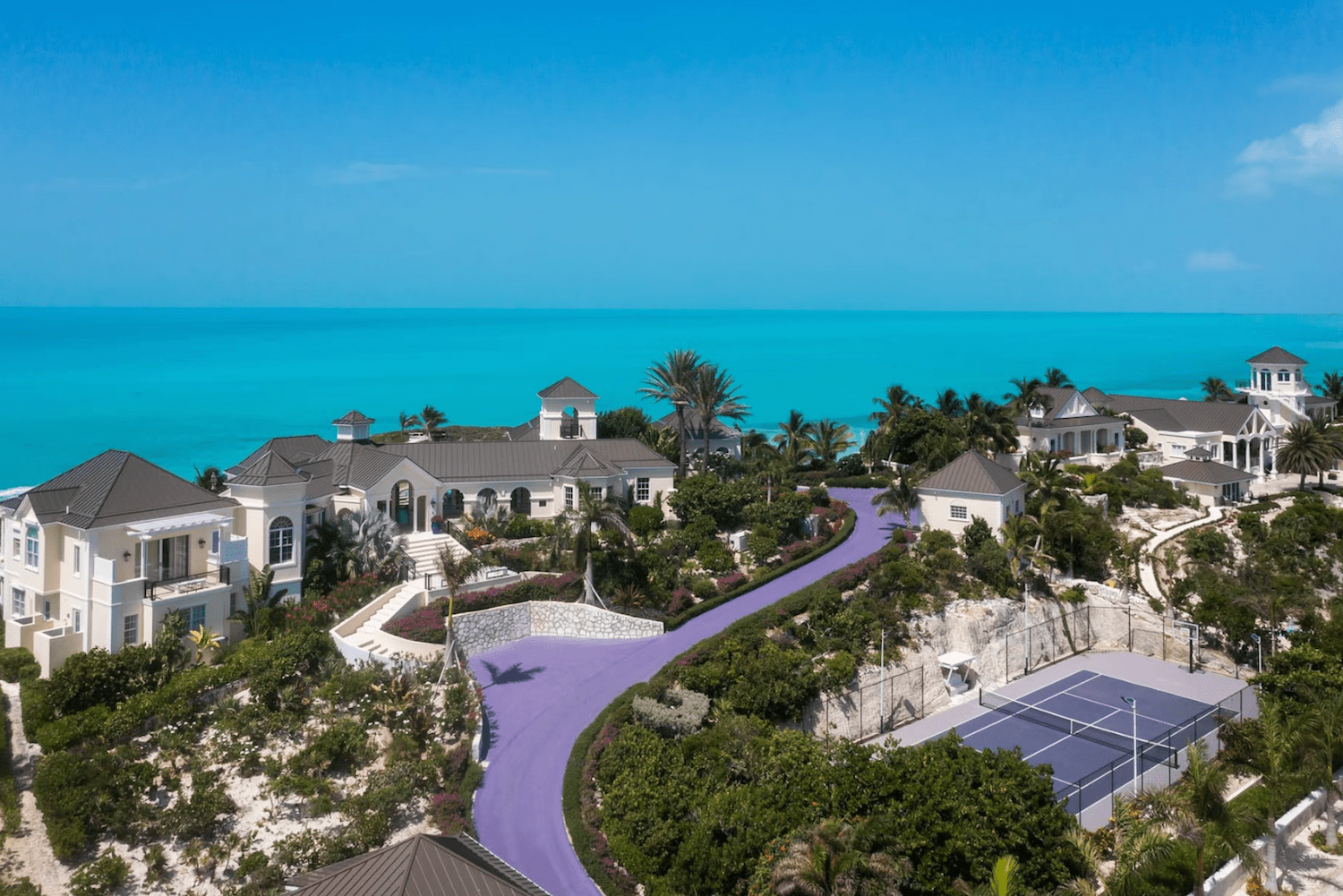 prince's caribbean estate with purple road and tennis court