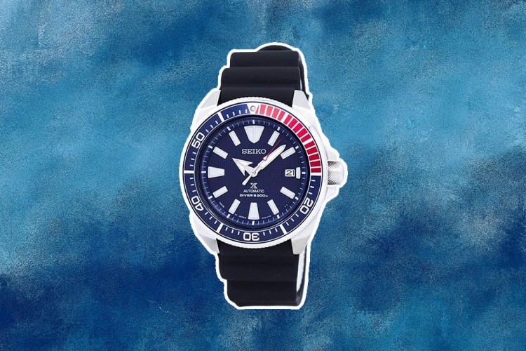 A Seiko Watch on an abstract blue water color background