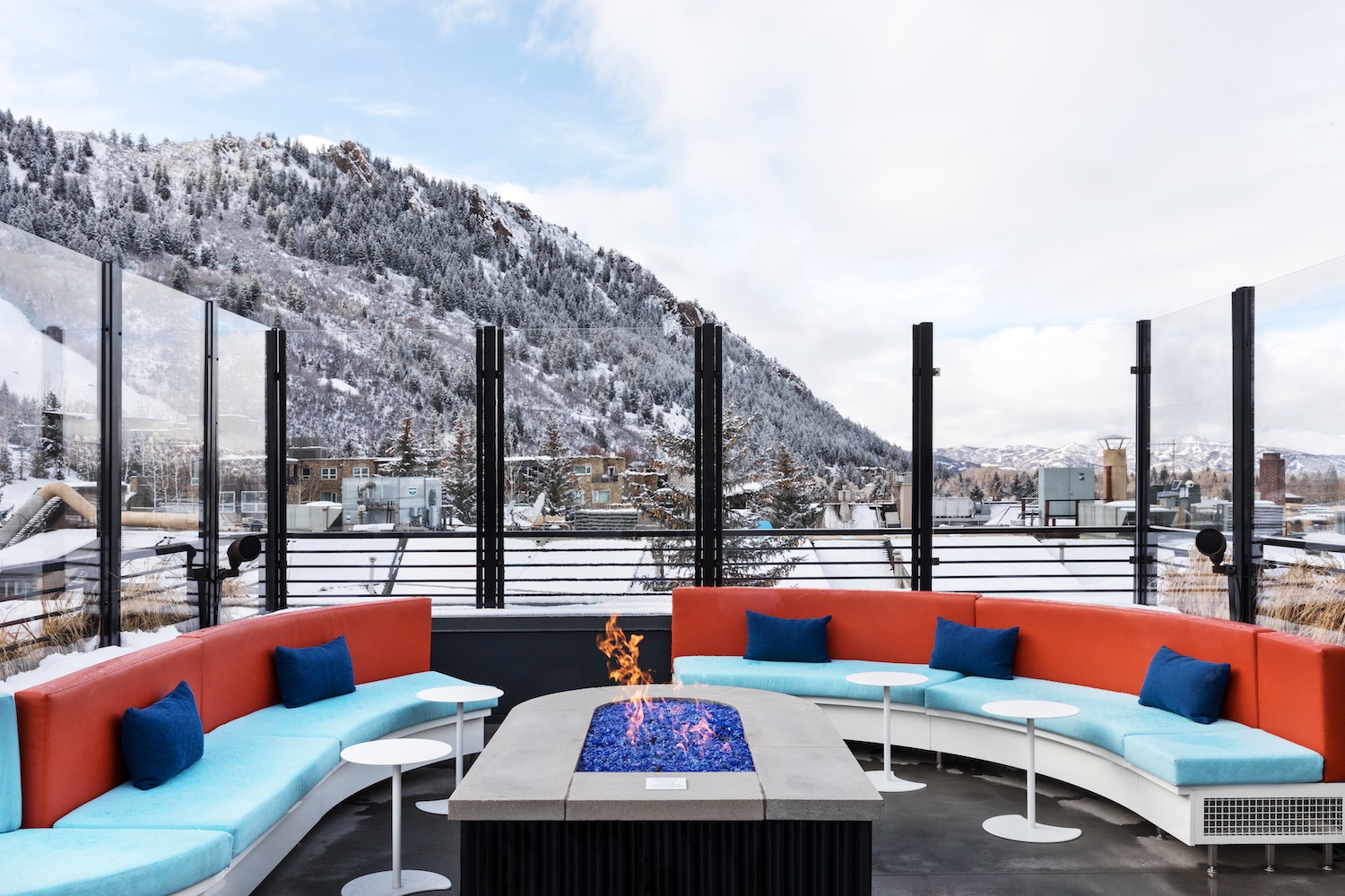 wet deck with seating around a fire pit at w aspen