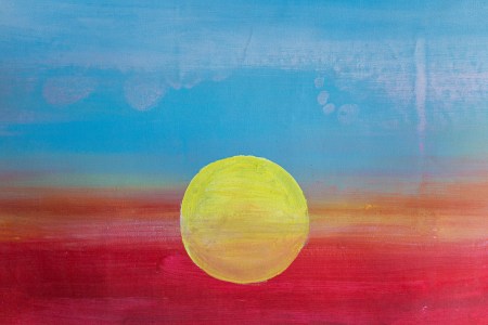 A painting of a setting sun.