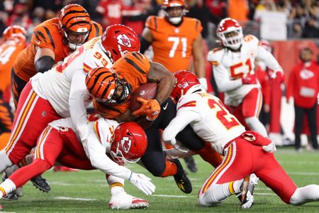 Bengals running back Samaje Perine carries the ball against the Chiefs.