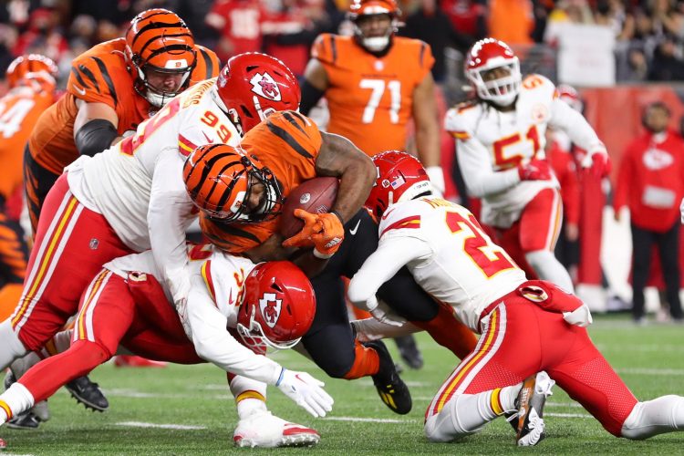Bengals running back Samaje Perine carries the ball against the Chiefs.