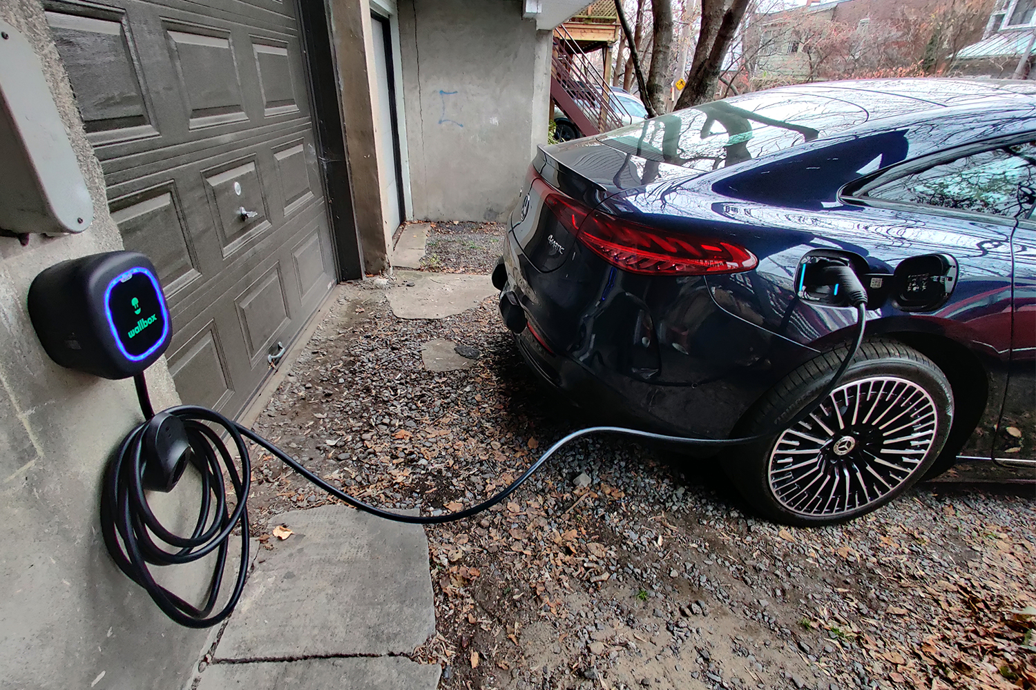 A Mercedes-Benz EQS charing at home using a Wallbox Pulsar Plus EV charger
