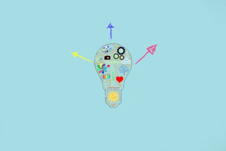 An illustration of a lightbulb, with colorful lines and squiggles.