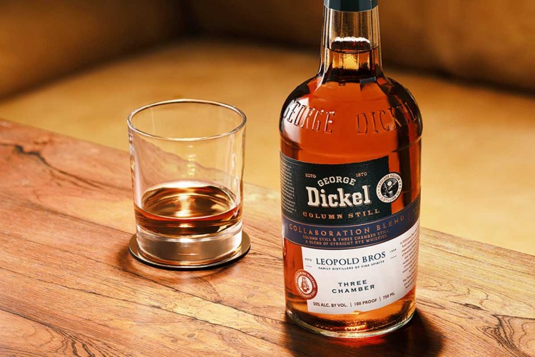 A glass and a bottle of George Dickel x Leopold Bros Collaboration Blend