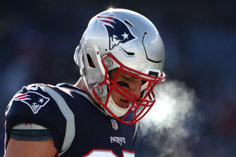 A picture of Rob Gronkowski breathing in the cold.