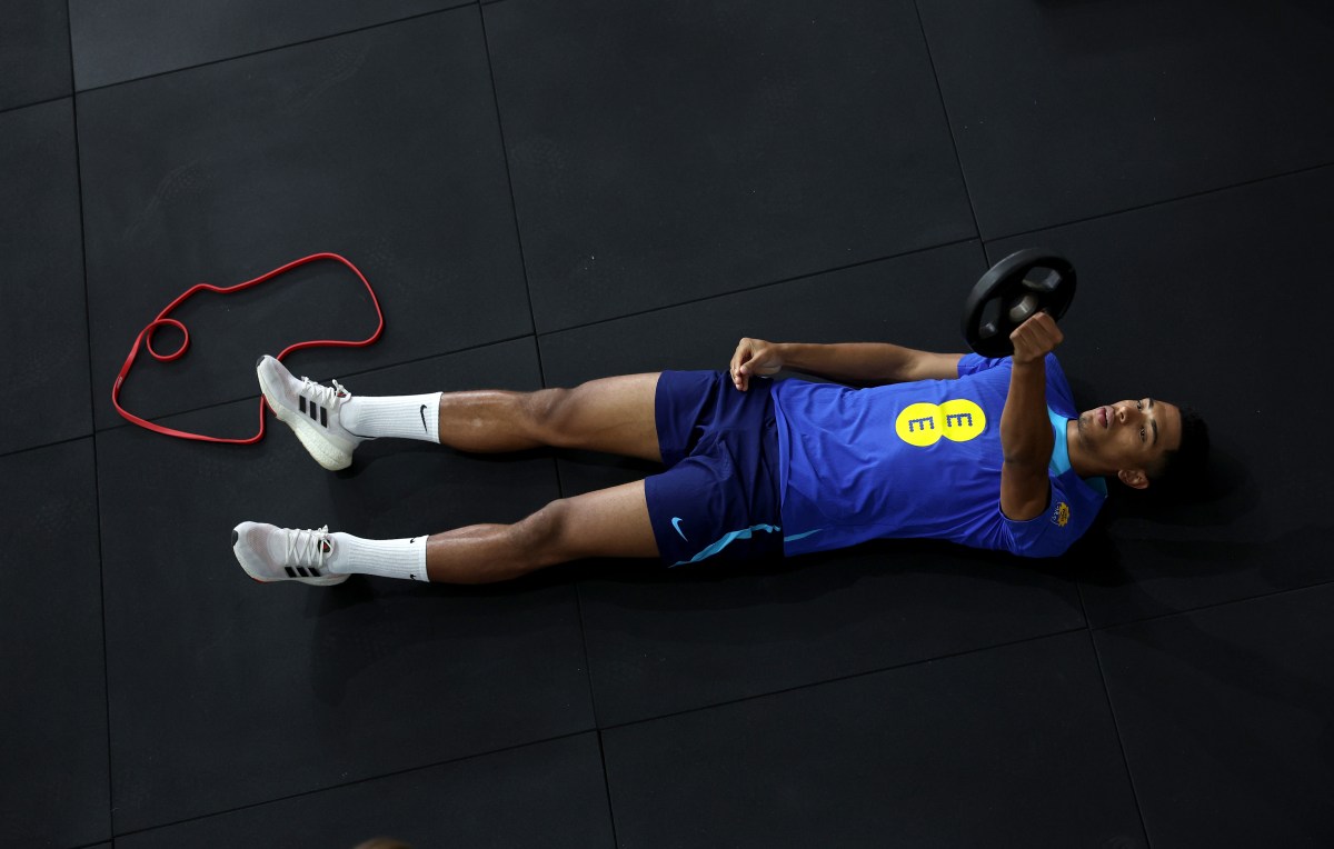 An athlete working out on the ground.
