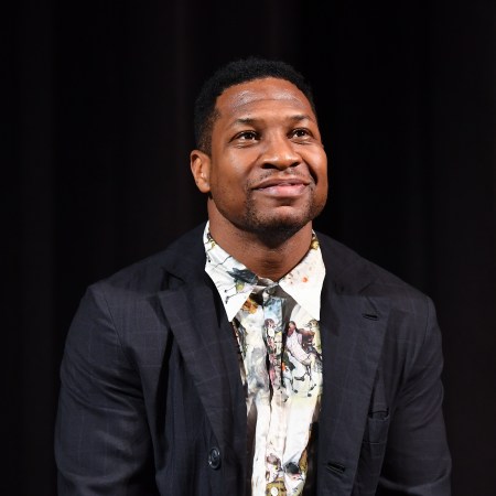 A photo of Jonathan Majors against a black background.