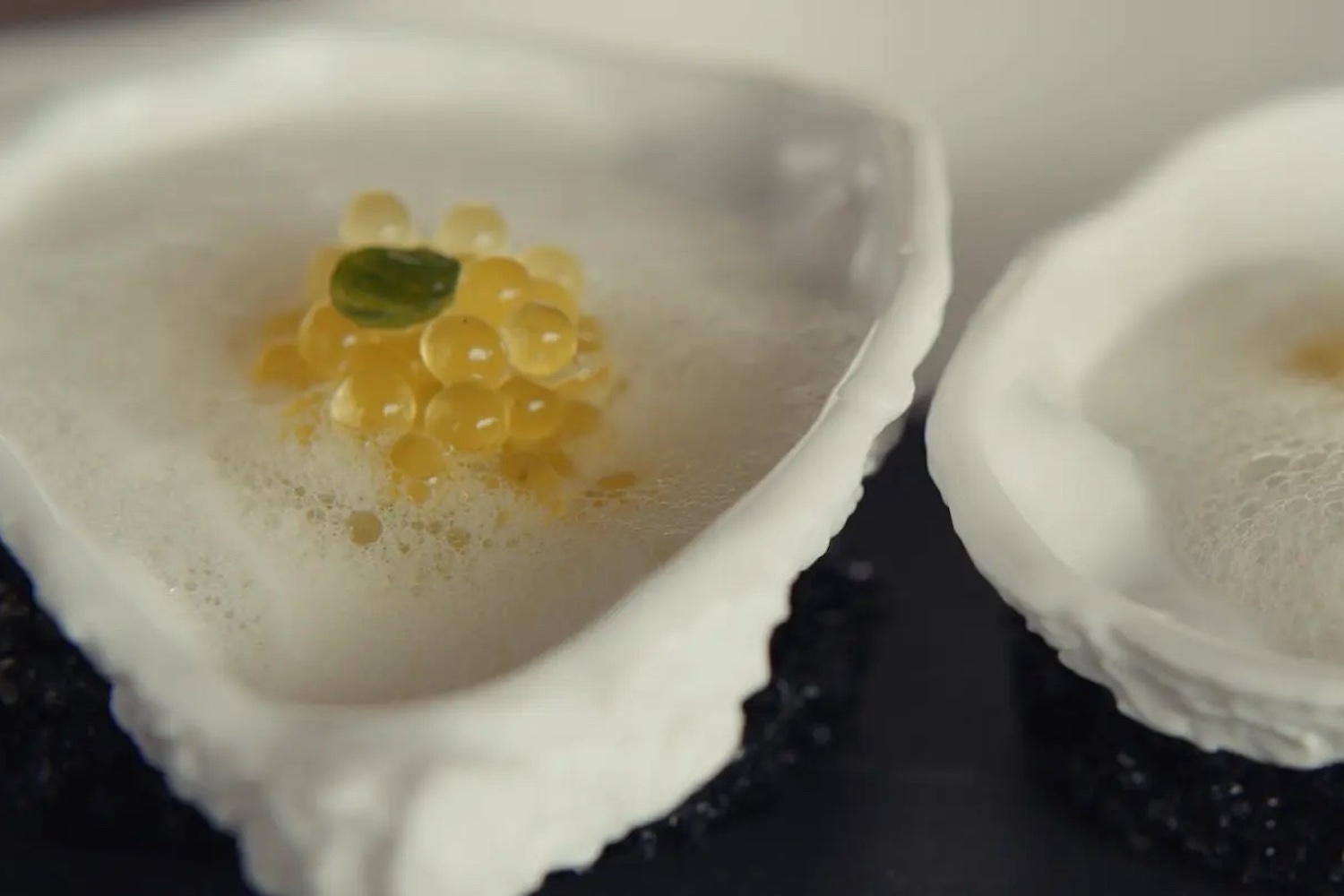 oyster dish with lemon pearls from the menu movie