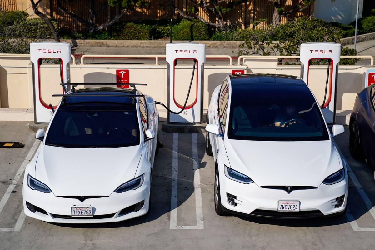 Tesla electric cars sit at a Supercharger station in Burbank, California