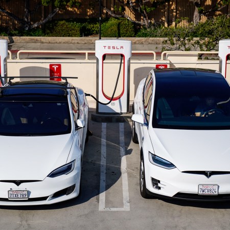 Tesla electric cars sit at a Supercharger station in Burbank, California