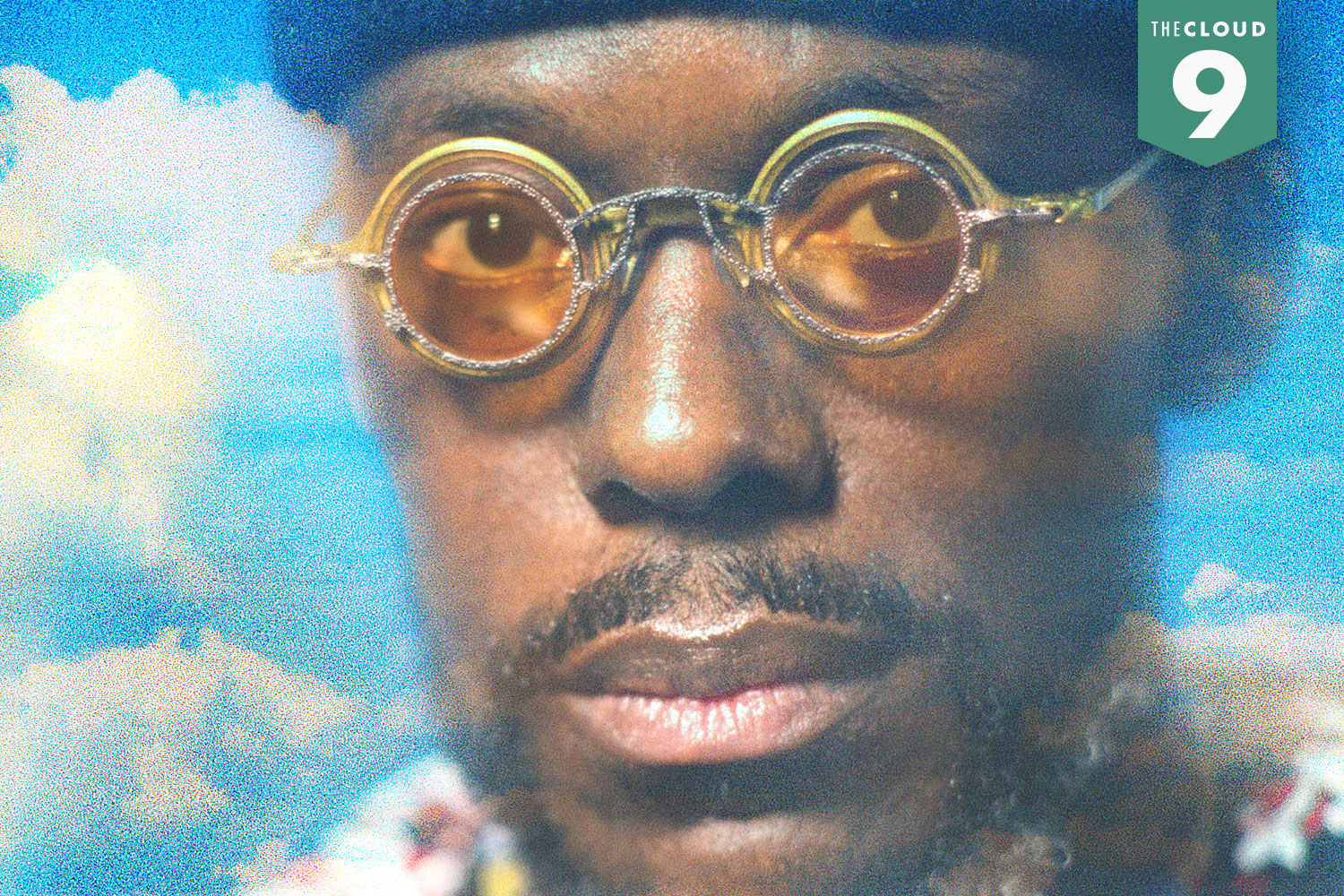 A composite image of Marcus Strickland on a cloud background.