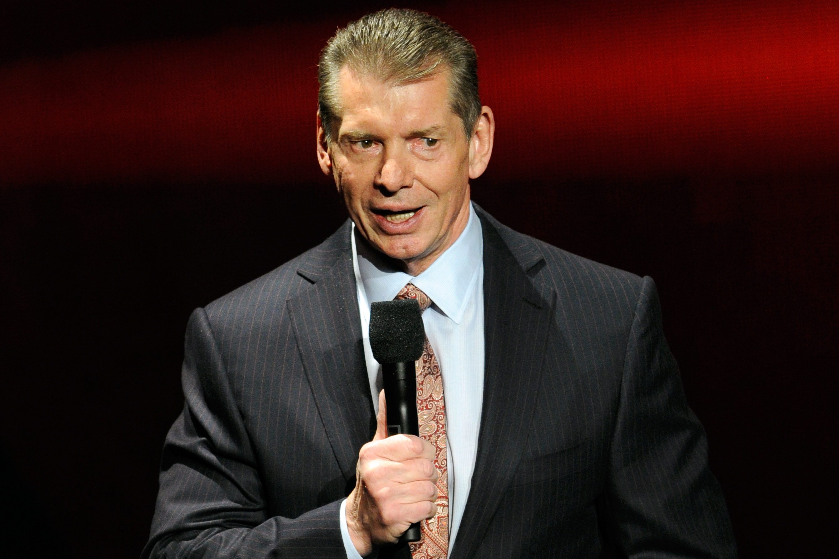 WWE CEO Vince McMahon speaks at a news conference in 2014.