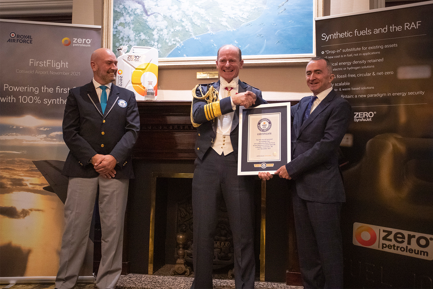 Paddy Lowe, right, receiving the Guinness World Record for the first aircraft powered by synthetic fuel, which was awarded to both Zero Petroleum and the Royal Air Force