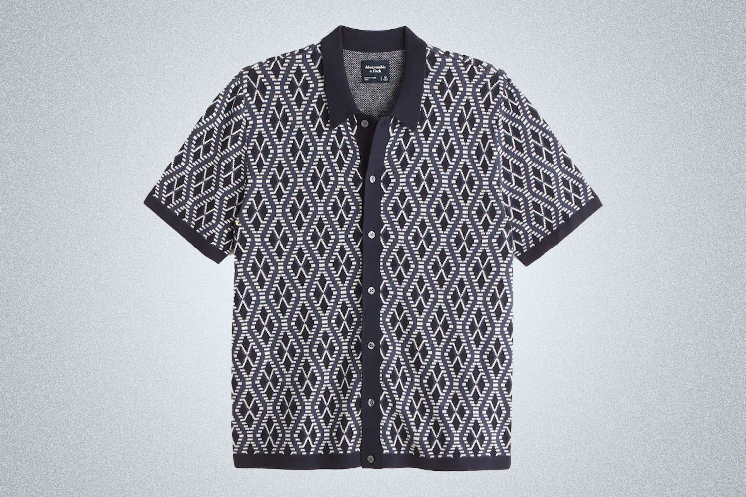 a black and white checked Abercrombie & Fitch sweater polo on a grey background