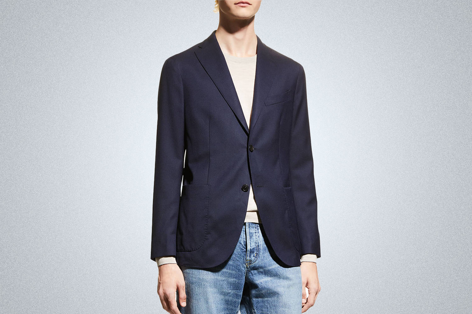 a model in a navy  Boglioli Unstructured Wool Hopsack Suit Jacket on a grey background