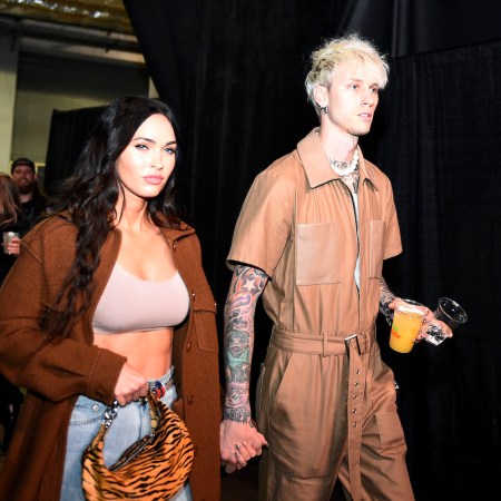 Megan Fox and Machine Gun Kelly arrive backstage during the UFC 261 event at VyStar Veterans Memorial Arena