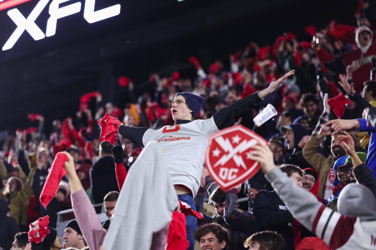 DC Defenders fans celebrate after a play during the second half of the XFL game between the DC Defenders and the Seattle Sea Dragons at Audi Field on February 19, 2023 in Washington, DC.
