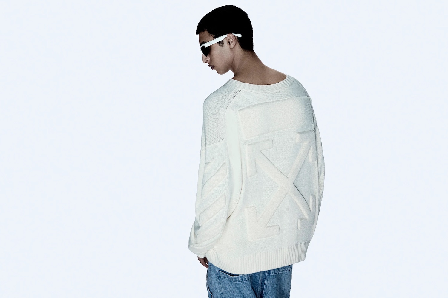 a model in Off-White sweater