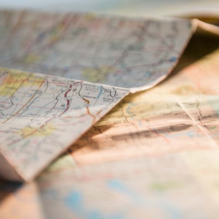 A close-up of a paper map. Paper maps are becoming more popular in recent years, with Millennials and Gen Zers taking advantage of the low-tech travel option.