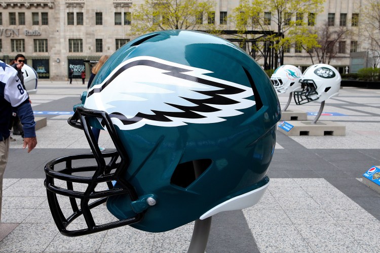 Philadelphia Eagles NFL football helmet is on display in Pioneer Court to commemorate the NFL Draft 2015 in Chicago on April 30, 2015